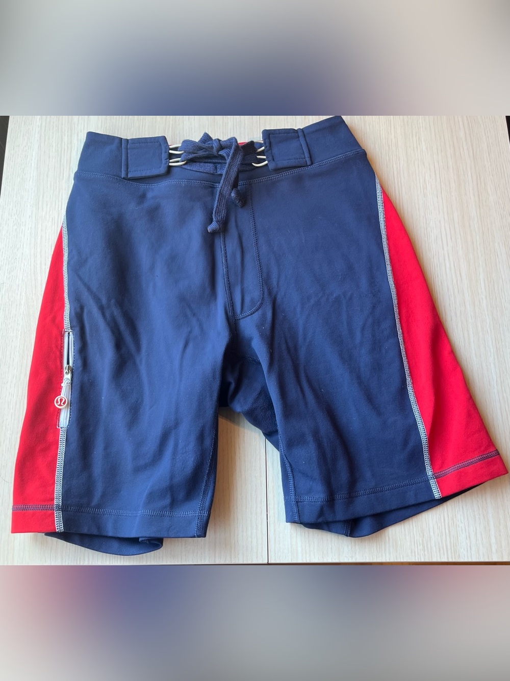 lululemon athletica Vintage Navy Shorts with Red Side Panels. XS